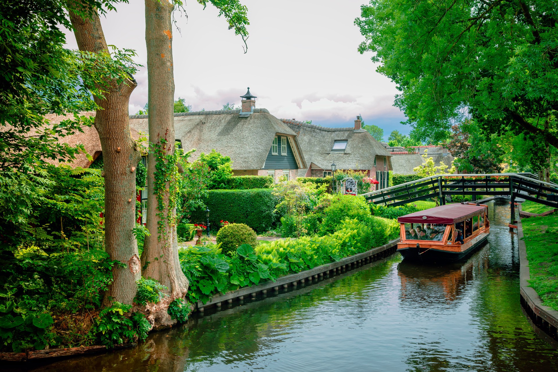 Picturesque Giethoorn Village with Canals and Thatched Roof Houses in Netherlands